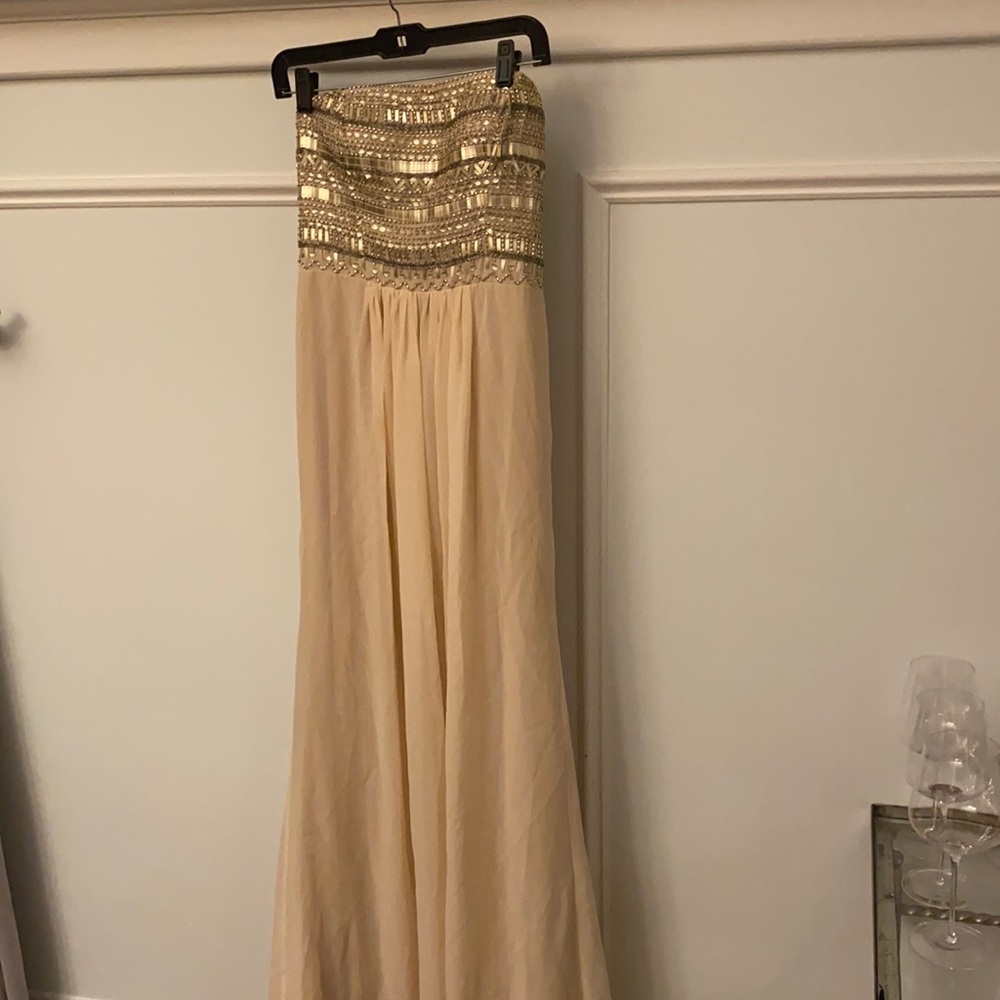 blush with gold sequences. evening gown, worn once. slight stains on bottom